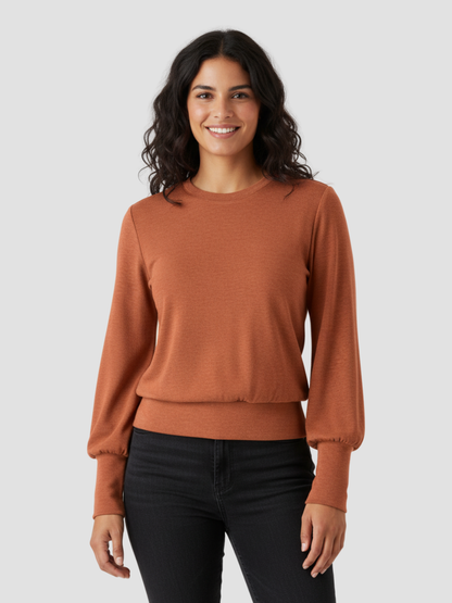 DACIO | TOP DE PUNTO ELÁSTICO CON SOPORTE – LÍNEAS LIMPIAS Y FACILIDAD COTIDIANA